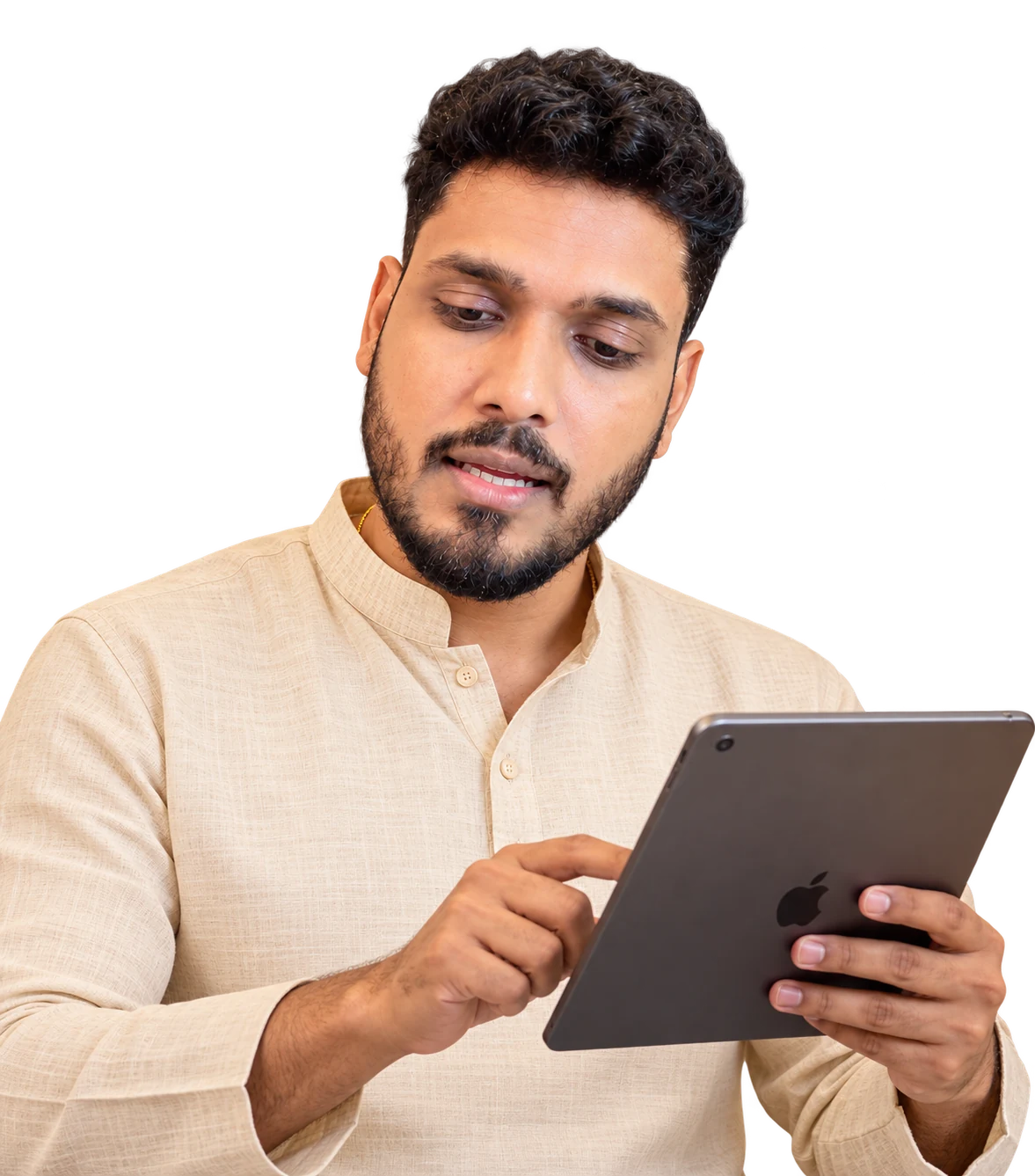 Sanidhya Tyagi, astrologer and numerologist, reading a chart on his tablet
